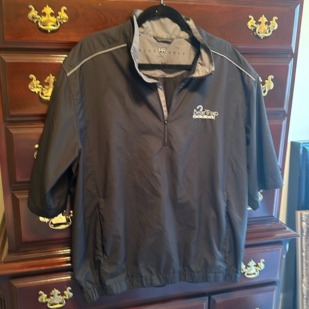 Black Nike golf shirt.  Size XL